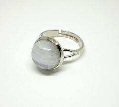 Moonstone ring inspired from Twilight movie! It is a perfect final touch for your Bella Swan look!   - the ring is adjustable - made from metal - the stone is a real pure Moonstone stone! Adjustable Silver Moon-shaped Moonstone Ring, Elegant Adjustable Moonstone Ring With Moon Phase, Moon Shaped Adjustable Crystal Ring For Gift, Adjustable Moon Phase Crystal Ring Gift, Adjustable Silver Moonstone Ring, Adjustable Moonstone Crystal Ring With Open Design, Adjustable White Moonstone Ring, Adjustable Round Moonstone Ring, White Adjustable Moonstone Ring As Gift