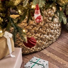 presents under the christmas tree on the floor