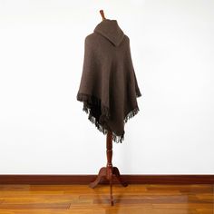 Introducing our exclusive unisex poncho, meticulously handcrafted from the finest llama wool yarn. This poncho is not just a garment; it's a blend of tradition and comfort. Its lightweight yet warm nature makes it an ideal choice for various settings. Key Features: Size: One Size, Approximately 48" Width x 43" Height / 122 cm Width x 110 cm Height, including fringe. Craftsmanship: Each poncho is a unique creation, handwoven by skilled indigenous artisans. Texture: soft to the touch, ensuring no Poncho With Hood, Wool Yarn, Llama, One Size Fits All, Throw Blanket, Hand Weaving, Character Design, Yarn, Key