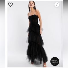 Black, Size 2, New With With Tags Never Worn. Ordered In 2 Sized And Went With A Different Size. Chic Ruffled Evening Gown, Black Ruffled Party Gown, Black Ruffled Gown For Party, Party Gown With Ruffles In Black, Evening Cocktail Gown With Ruffles, Chic Tulle Gown With Ruffles, Black Tulle Gown With Ruffles, Chic Cocktail Gown With Ruffles, Chic Tulle Evening Dress With Ruffles