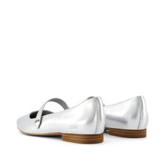 Refine your style with our modern ballet flat. Featuring a softly squared toe, a chic strap and high-quality metallic leather uppers, our Bianca is in a class of her own. Pair with dresses or jeans for a put-together look without sacrificing comfort! Leather upper with metallic detailing. TOMS leather products support responsible manufacturing via the Leather Working Group. Rubber outsole. Non-removable OrthoLite® Eco LT-Hybrid™ insole for enhanced comfort and breathability made with 26% eco con Modern Slip-on Ballet Flats For Summer, Silver Slip-on Flats With Removable Insole, Sleek Closed Toe Ballet Flats For Spring, Spring Sleek Closed Toe Ballet Flats, Sleek Spring Closed Toe Ballet Flats, Sleek Slip-on Ballet Flats For Spring, Modern Formal Ballet Flats For Spring, Modern Formal Spring Ballet Flats, Silver Ballet Flats With Round Toe For Spring