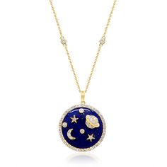 a necklace with the moon and stars on it, hanging from a gold plated chain