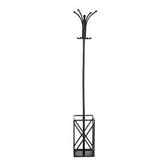 a black coat rack with two coats hanging from it's sides and an umbrella stand on the other side