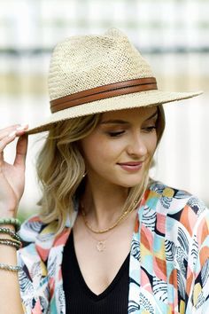 NON-ELIGIBLE FOR RETURN. FINAL SALE Channel your inner cowgirl with our Western Dreamer Panama Hat. Designed with rustic charm and western flair, this wide brim hat is perfect for western country concerts, a day on the ranch, or a sunny resort vacation, offering both style and sun protection. Handmade Woven Crisscross Pattern Style: Western Panama Hat Vegan Leather Band Accent 100% Paper Circumference: 22.25" Brim: 2.75" Crown height: 4.75" One size fits most Cream Short Brim Sun Hat For Rodeo, Cream Sun Hat With Curved Brim For Rodeo, Country Style Wide Brim Panama Hat, Natural Brimmed Hat For Ranch, Casual Brimmed Hat For Ranch, Cream Short Brim Panama Hat, Western Cream Flat Brim Sun Hat, Western Style Cream Flat Brim Sun Hat, Western Style Cream Sun Hat With Flat Brim