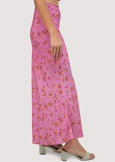 Update your spring-summer wardrobe with the Love Spell Maxi Skirt. Featuring a romantic pink floral print, this skirt is a feminine and chic staple piece. It can be easily styled with a chunky sweater or knit top for a versatile and effortless look. Experience the magic of love with this must-have maxi skirt. WSWH06337 Imported Lined 100% Rayon Model is 5 ft 9.5 inches; Bust: 32", Waist: 24", Hips: 34" and wearing a size Small Runs true to size Hand wash or wash with gentle cycle with cold water Love Spell, Pink Floral Print, Denim Accessories, Love Spells, Chunky Sweater, Short Rompers, Staple Pieces, A Romantic, Summer Wardrobe