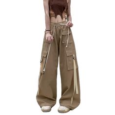 PRICES MAY VARY. Stylish and comfortable: Our Arynna women's baggy cargo pants are a must-have for a fashionable yet practical wardrobe. Plenty of storage: With multiple pockets, these cargo pants for women provide ample space for all your essentials, including your phone, keys, and wallet. Durable design: Made from high-quality materials, these pants are designed to withstand the demands of your everyday routine, perfect for outdoor activities, travel, and more. Versatile style: These cargo pan Baggy Brown Cargo Jeans With Multiple Pockets, Brown Baggy High Waist Cargo Pants, High Waist Brown Parachute Pants With Cargo Pockets, Brown Full-length Cargo Pants With Pockets, Brown Wide-leg Parachute Pants With Cargo Pockets, Baggy Streetwear, Hong Kong Style, Overalls Men, Baggy Cargo Pants