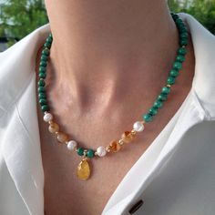 Malachite choker necklace with pearl and citrine pendant. Statement natural gemstone beaded necklace for women. Large green white yellow gold handmade necklace with bead and gemstone. Bohemian bright necklace in gold color are suitable for an casual look, evening look and for a holiday. These necklace will be a good Mothers day, anniversary, wedding or birthday gift for women, mom, wife, girlfriend, sister or daughter. Women's necklace with natural stone. It emphasizes the beauty of your neck an Handmade Yellow Pearl Necklace For Gift, Elegant Green Citrine Jewelry, Elegant Beaded Citrine Necklaces, Elegant Citrine Beaded Necklaces, Elegant Citrine Gemstone Bead Necklaces, Yellow Beaded Pearl Necklace As Gift, Beaded Emerald Necklace For Gift, Yellow Beaded Pearl Necklace Gift, Elegant Citrine Necklaces With Natural Stones