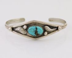 Jewelry Type: BraceletMetal Purity: .925 Sterling SilverMain Stone: TurquoiseType of Main Stone: Natural Mined TurquoiseSecondary Stone: N/ACountry of Origin: USASigned: NoBrand / Artisan: Indian Hand Made JewelryEthnic & Regional Style: Native AmericanWeight (grams): 13.7Fits Wrist Size (inches): 6.0 - 7.0Side to Side Inside Bracelet (inches): 2.5Gap Width (inches): 1.0End to End Measurement (inches): 5.5This Native American Cuff Bracelet will make a great addition to your fine jewelry collecti Vintage Turquoise Sterling Silver Bracelets, Vintage Adjustable Turquoise Sterling Silver Bracelet, Vintage Turquoise Sterling Silver Bracelet, Vintage Turquoise Sterling Silver Bracelet Collectible, Sugilite Jewelry, Azurite Jewelry, Spiny Oyster Jewelry, Native American Jewelry Navajo, Inlaid Jewelry