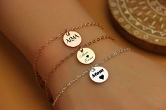 ✅ A bracelet that speaks volumes without saying a word. Our personalized engraving bracelet lets you immortalize what matters most. ✅ Available in silver, rose gold and yellow gold ✅ Customize with a name, date, coordinates, or special message ✅ Bracelet length options from 3.5-9 inches  ✅ Metal: Gold plated over brass 🎁 This coin style bracelet is more than just a piece of jewelry - it's a wearable symbol that celebrates your most cherished people, places, and moments. Engrave it with a name that fills your heart or coordinates of a special location. Slip it on each day as a constant reminder of what (or who) inspires you. This bracelet is a thoughtful gift that will be treasured for years to come. ✨Whether you're shopping for yourself or a loved one, this personalized bracelet is the pe Engraved Charm Bracelet For Mother's Day Personalized Gift, Hypoallergenic Inspirational Name Bracelet As Gift, Engraved Bracelets For Birthday And Mother's Day, Mother's Day Friendship Name Bracelet In Stainless Steel, Engraved Charm Bracelet For Birthday And Mother's Day, Adjustable Jewelry With Engraving Option For Birthday Gift, Engraved Name Bracelet For Mother's Day, Mother's Day Engraved Charm Bracelet, Mother's Day Engraved Bracelet Gift