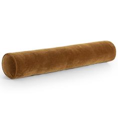 a roll of brown fabric sitting on top of a white surface