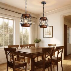 a dining room table and chairs with lights hanging from the ceiling