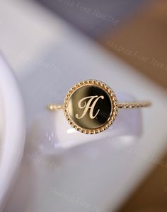 Customized Cursive Initial Ring, Script Initial Ring, Engraved Initial Ring, Custom Letter Ring, Dainty Alphabet Single Letter Pinky Ring ✿GOLD PURITY✿ 14K Solid Gold (58.3% pure gold and 41.7% alloy.) ✿HYPOALLERGENIC✿ All jewelry are made without lead, nickel, and cadmium. Hypoallergenic jewelry is higher-grade and purer. It is safe for the most sensitive skin or even babies! Production time Our jewelry is purely handmade, every production detail, we pay close attention to, every step of the pr Elegant 14k Gold Engraved Initials Ring, Formal White Gold Jewelry With Initials, Elegant Adjustable 14k Gold Initial Ring, Elegant Initial Ring With Polished Round Band, Elegant Initial Ring With Polished Finish And Round Band, Luxury Initial Ring With Round Band For Promise, Elegant Sterling Silver Initial Ring For Promise, Elegant Personalized 14k Gold Stackable Rings, Elegant Sterling Silver Open Initial Ring