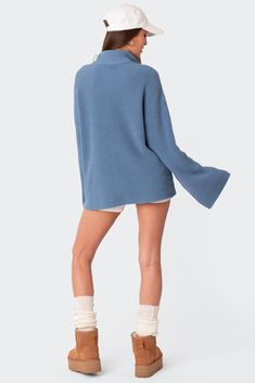 PRODUCT INFO Zip sweater Oversized fit High neckline Knitted fabric 100% Cotton Model wears size S Model height is 5'7 Item care: Wash with similar color Trendy Blue V-neck Sweater For Winter, Oversized Ribbed Cropped Sweater For Loungewear, Oversized Ribbed Turtleneck Sweater, Blue Knit V-neck Long Sleeve Sweater, Blue V-neck Tops With Ribbed Cuffs, Chunky Knit Crew Neck Sweater For Loungewear, Blue Cropped Sweater With Ribbed Cuffs For Fall, Blue V-neck Soft Knit Sweater, Oversized Blue Sweater For Fall