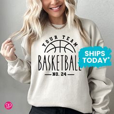 Custom Team Basketball Player Sweatshirt, Your Team Basketball with Ball & Net Sweater, Personalized Sports Outfit (SKINNY TEXT) * SIZING * Please see images with sizing chart details. All of our sweatshirts are a unisex fit for both men and women.  * SHIPPING * All orders are printed by hand and shipped out within 1 business day. All items are shipped via USPS First Class Mail (3 to 5 days transit time).  Need it sooner? Shipping upgrades available at checkout (transit time is 1 to 3 days based on your location -- USA only) * OUR PROCESS * We print our shirts by hand with 100% eco-friendly water based inks. Water based inks produce a super soft, breathable print with unmatched comfort and durability. We DO NOT USE vinyl. * EXCHANGE POLICY * We will gladly exchange unworn items within 14 d