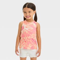 Add cool comfort to your little one's closet with this Tie-Dye Tank Top from Cat & Jack™ Fashioned in a relaxed fit, this tank top features a casual crewneck and a tie-dye print in fresh peach and pink hues for a fun whimsical look. The lightweight cotton-blend fabric ensures all-day comfort, while the pullover style makes dressing easy. Have them pair this sleeveless top with a range of bottoms — from jeans to shorts to skirts and more — for a variety of looks. Cat & Jack™: Kids’ clothing with Girls Tie, Cat Top, Tie Dye Tank Top, Tie Dye Designs, Tie Dye Print, Kids Clothing, Pullover Styling, Toddler Girl, Shoe Laces