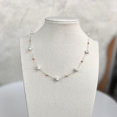 If you are interested in placing a bulk order (50+ pieces), please message us for special pricing.--gold pearl necklace, pearl beaded necklace, pearl choker, pearl jewelry for her-- ► DETAILS  -18k gold over stainless steel + pearls ►Heavenly Materials Our jewellery pieces are delicately handcrafted with gold-fill, sterling silver, stainless steel and gold-plating, combining rich, warm tones with an effortless shine.  ►Prompt Dispatch and Delivery Rossie Jewellery is a small business based in th Elegant Gold Pearl Choker, White Pearl Choker With Delicate Chain, Pearl White Pearl Necklace With Delicate Chain, Dainty Pearl White Beaded Necklaces With Pearl Chain, Dainty Pearl White Clavicle Chain Necklace, Dainty Gold Pearl Bridal Necklace, Gold Pearl Bridal Necklace With Delicate Chain, Delicate Pearl Necklaces With Round Beads, Delicate Pearl-embellished Necklaces As Gifts