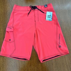 Billabong Recycler Men’s 31 Recycler All Day Px3 Board Shorts Red Swim Trunks Spandex Very Stretchy New Platinum Stretch Athletes Choice Recycled Material Perfect For Lifeguards Solid Neo Red Pocket With Stretch Rope Hook To Attach Valuables To Velcro Closure Pink Bottoms With Built-in Shorts For Outdoor, Casual Red Swimwear For Surfing, Red Surfing Shorts, Red Swim Trunks For Summer Water Sports, Fitted Swim Trunks With Pockets For Sports, Red Stretch Shorts For Swimming, Red Short Bottoms For Surfing, Casual Fitted Red Swim Trunks, Red Fitted Casual Swim Trunks