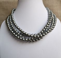 This necklace is 18inches long.it has a Lobster clasp and vintage receptacle,and a 2 inches externder chain.They are 8mm grey glass pearls They are gray pearls l in the picture. It is great gift for your bridesmaids and yourself. I can do this necklace in different color pearls.Please feel free contact me if you have some ideas. - back to my store: https://www.etsy.com/shop/goodglasspearl?ref=l2-shopheader-name Button Pearl Earrings, Wedding Pearl Necklace, Big Pearl Necklace, Large Pearl Necklace, Bride Bracelet, Pink Pearl Earrings, Large Pearl Earrings, Necklaces Pearl, Pearl Bracelet Wedding