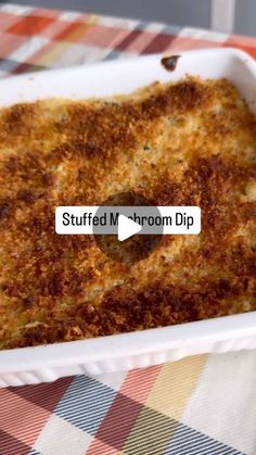 a casserole dish on a table with the words stuffed m - room dip