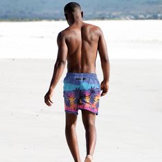 There is nothing more majestic than a beautiful sunset over the crashing waves of the ocean. There aren't many words that can describe it, but we've tried to capture the feeling with these shorts. * Fabric composition: (may vary by 5%) 91% recycled polyester, 9% spandex * Liner composition: 92% polyester, 8% spandex * Fabric weight (may vary by 5 5.13 oz/yd² (174 g/m²)  * Four-way stretch water-repellent microfiber fabric * Anti-chafe mesh inner liner * Elastic waistband with drawcord * Mesh poc Beachy Surfing Shorts For Summer, Blue Tropical Shorts For Beach Season, Blue Shorts For Beach In Summer, Beachy Shorts For Surfing In Summer, Blue Beach Shorts For Warm Weather, Blue Shorts For Beach In Warm Weather, Blue Shorts For Beach And Warm Weather, Bermuda Beach Shorts For Beach Season, Beachy Shorts For Summer Surfing