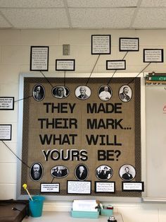 a bulletin board with some writing on it and many pictures hanging up above the wall