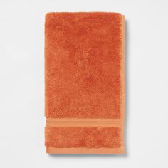 an orange towel on a white background