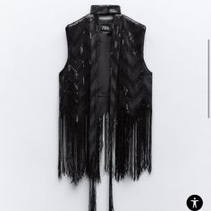 Nwt. In Perfect New Condition. Size Is Xs-S On The Tag. No Closure, Open Front Vest. Very Well Made Vest With Sequins And Fringe. Scarf Is Included. Black. 93% Polyester 7% Elastane.Fringed Hem. Lining 100% Polyester. Vest 20” And Fringe 11”. The Zara Model Is Wearing Matching Skirt. I Couldn’t Get It. Vest Is Not Long Like It Shows In The Picture. No Trades. Black Winter Vest For Night Out, Black Vest For Night Out In Fall, Chic Zara Winter Vest, Zara Fitted Vest For Winter, Zara Fitted Winter Vest, Elegant Zara Winter Vest, Chic Vest For Fall Party, Black Party Vest For Fall, Zara Black Fitted Vest