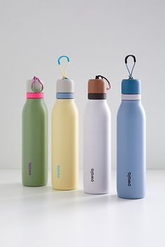 thermos bottles are lined up next to each other