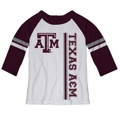 Celebrate and cheer on game day with our Texas AM White Girls Tee Raglan Three Quarter Sleeve An Officially Licensed product sold by Vive La Fete Scoop neck Item number: NTAM09GTWMR Care instructions • 100% Polyester • Machine wash-warm • Do not add softeners • Tumble dry low. Remove promptly • Performance moisture wicking fabric Varsity Tops For Cheerleading During Football Season, Game Day Long Sleeve Tops With Team Logo, Varsity Graphic Print Top For Fan Gear, Team Colors Tops For Game Day, Game Day Football Season Tops With Logo Print, Football Season Game Day Logo Print Tops, School Spirit T-shirt For Cheerleading In Fall, Team Spirit Tops For Game Day Sports Season, Varsity Logo Print Top For Game Day