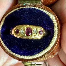 Lovely 18k gold Petite Natural & Genuine Ruby & Diamond ring  The ring is approximately a size 6 but can be easily sized.  Classic in design with side detailing (a bit worn- see photos) Many hallmarks on the inside...see photos. Hallmarks indicate Birmingham 1907 Hallmarked 18=18k gold...tested as such The center ruby measures approximately 3.5x 2.75mm  2 side rubies: 2.5mm There are a total of 2 diamonds somewhat crudely cut approx. 2.25 mm each for accents The rubies are a beautiful fuschia re Victorian Yellow Gold Diamond Ring With Gemstone, Antique Ruby Ring Hallmarked, Antique Ruby Diamond Ring Hallmarked, Antique Hallmarked Ruby Signet Ring, Victorian Gold Diamond Ring With Ruby, Victorian Gold Ring With Ruby, Victorian Gold Rings With Ruby, Victorian Style Gold Rings With Ruby, Vintage Hallmarked Yellow Gold Birthstone Ring