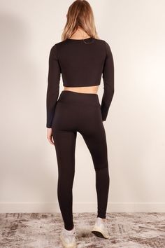 A polyamide elastane set featuring a long sleeve crop top, high waist leggings, and 4 way stretch from Capella Apparel Activewear Style Number: ATP71016 Fabric Details: 80% Polyamide, 20% Elastane Model is 5'9" and is wearing a Small Top - Bust: 13", Body Length: 14", Sleeve Length: 23" Bottom - Inseam: 27", Waist: 11.75", Total Length: 36.75" Activewear Style, Leggings Activewear, Hair Catalog, High Waist Leggings, Activewear Fashion, Activewear Sets, Active Wear Leggings, Long Sleeve Crop, Short Jumpsuit