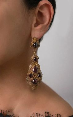 For Sale on 1stDibs - Early 19th Century Cabochon Garnet Drop Earrings c.1840s Composition: 15K Yellow Gold and Cabochon Garnets Color: 15K Yellow Gold Handmade Victorian Jewelry With Historical Design For Evening, Baroque Jewelry With Historical Design For Formal Occasions, Victorian Gold Jewelry For Opera, Baroque Historical Jewelry For Formal Occasions, Baroque Historical Design Jewelry For Formal Occasions, Victorian Baroque Formal Jewelry, Antique Gold Jewelry For Opera, Victorian Gold Cabochon Earrings, Gold Victorian Cabochon Earrings