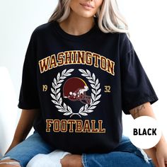 Perfect sweatshirt for Washington football fans this season! Ideal for any situation, a unisex heavy blend crewneck sweatshirt is pure comfort. These garments are made from polyester and cotton. This combination helps designs come out looking fresh and beautiful. The collar is ribbed knit, so it retains its shape even after washing. There are no itchy side seams on these sweaters.  .: 50% cotton, 50% polyester .: Medium-heavy fabric (8.0 oz/yd² (271.25 g/m .: Loose fit .: Sewn-in label .: Runs t Crew Neck T-shirt For Game Day In Fall, College Team Logo Hoodie With Crew Neck, College Crew Neck Hoodie With Team Logo, College Hoodie With Team Logo, Fan Apparel Crew Neck Hoodie, Collegiate Black Sweatshirt For Football Season, Collegiate Crew Neck Hoodie Fan Gear, College Sports Season Crew T-shirt, Collegiate Fan Gear Hoodie With Crew Neck