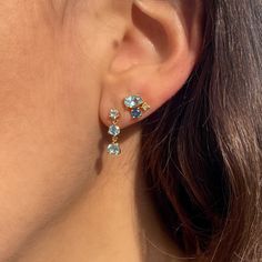 Dive into a deep iridescent pool of hues with this gorgeous 14K gold stud. A perfect cluster of stones that's set off by 0.01 Ct diamond set in a northern star, this handcrafted earring is nothing short of ethereal. Sold as a single stud. Gold Cluster Jewelry With Sparkling Stones, Gold Cluster Jewelry With Gemstone Accents, Northern Star, Star Studs, Handcrafted Earrings, Gold Stud, Diamond Set, Color Dorado, Pink Diamond