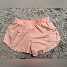 Never Worn, Salmon Color. Size Large, Dri-Fit Pink Sports Shorts For Spring, Summer Sports Pink Bottoms, Nike Pink Bottoms With Pockets, Pink Summer Sports Bottoms, Pink Nike Bottoms With Pockets, Pink Athletic Shorts With Pockets For Spring, Pink Athletic Shorts For Spring Workout, Pink Summer Athletic Shorts For Sports, Nike Pink Athletic Shorts For Summer