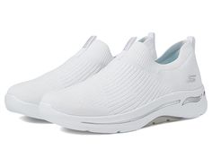 SKECHERS Performance Go Walk Arch Fit - 124409 - Women's Shoes : White : The SKECHERS Go Walk Arch Fit Iconic sneaker will make every walk a comfortable one with a stretch knit fabric upper, slip-on entry, and a machine washable design. Woven-in knit textured panels at toe, heel, and instep panel for added structure. Rear pull-tab offers easy entry. Tonal collar and heel panel. Signature logo accents at the side panel and heel stripe. Breathable fabric lining. Lightweight, responsive ULTRA GO cu Comfortable Sports Slip-ons With Arch Support, White Cushioned Slip-ons For Sports, Sporty Slip-ons With Cushioned Footbed For Sports, Slip-on Sneakers With Rubber Sole For Light Exercise, Low-top Slip-on Sneakers With Arch Support, White Low-top Slip-ons For Sports, Slip-resistant Slip-on Sneakers For Sports, Comfortable Slip-resistant Sneakers For Light Exercise, Slip-on Sneakers For Light Exercise