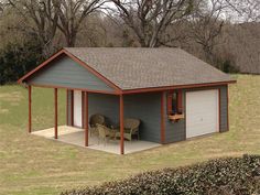 a small garage with two chairs in the front and one on the side, next to a grassy field