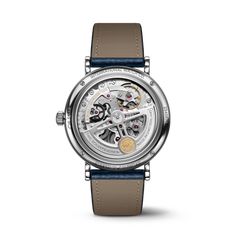 The Portofino Perpetual Calendar features the legendary perpetual calendar developed by Kurt Klaus during the 1980s. Elegant Silver Watch With Skeleton Dial, Elegant Automatic White Gold Watch Accessories, Elegant White Gold Automatic Watch Accessories, Timeless Skeleton Dial Watch Accessories For Anniversary, Timeless White Gold Watch With Skeleton Dial, Automatic White Gold Watch Accessories For Anniversary, Luxury White Gold Watches With Skeleton Dial, Timeless Round Case Formal Watch, Timeless Watch Accessories With Subdials In Round Case