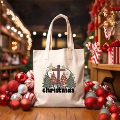 Merry Christmas Shoulder Bag, Bible Bag, Love Like Jesus, Jesus Christ, Xmas Gifts, Christian Tote Bag, Christmas Tote Bag, Christmas Presents 6 oz./yd² (US), 10 oz./L yd (CA), 100% cotton 20 1/2" self-fabric handles 9 1/2" handle drop Processing and shipping Processing 1-3 business days First class mail 4-6 days Priority Mail 2-4 days Priority Mail Express 1-2 days If you have any question or concern please let us know! Holiday Tote Bag, Nurse Tote Bag, Christian Tote Bags, Bible Bag, Christmas Treat Bags, Christmas Tote Bags, Christmas Tote, Nurse Christmas, Holiday Essentials