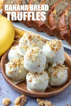 banana bread truffles on a plate with walnuts and bananas in the background