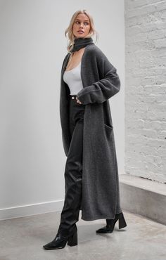 Effortless luxury with an edge. Upgrade your winter wardrobe with Merino Cashmere essentials. This supremely soft, oversized throw over merges warmth with versatility and style, ready to elevate your weekend look. Pair with Luxe Rib™ Basics and Vegan Pebbled™. 80% merino wool | 15% cashmere | 5% nylon Super warm with soft hand feel Natural fibres that are light-weight, allow breathability and regulate temperature A touch of nylon to help retain shape and longevity Dropped shoulder for relaxed fi Solid Cashmere Long Coat, Gray Oversized Long Outerwear, Gray Long Oversized Outerwear, Solid Color Long Cashmere Coat, Chic Long Sweater Coat For Loungewear, Soft Knit Relaxed Outerwear For Work, Relaxed Fit Soft Knit Outerwear For Work, Chic Open Front Outerwear For Loungewear, Chic Open Front Loungewear Outerwear