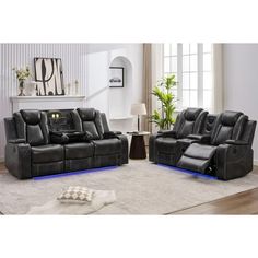 two recliners and a sofa in a living room