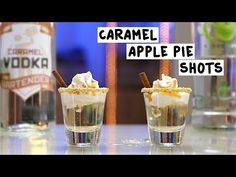 two shot glasses filled with ice cream and caramel apple pie shots on a table