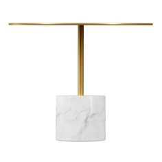 a white marble and gold metal table lamp