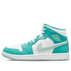 Introducing the new Women's Air Jordan 1 Mid Marine Green sneakers. A bold offering from Jordan brand, these shoes proudly symbolize the legacy of Michael Jordan and his original Air Jordan 1s from 1985. Crafted with high-top construction and white laces, these sneakers feature island green highlights that subtly stand out against the predominantly white upper. Core details like the Nike Swoosh on the side, the Air Jordan logo on the outer ankle, and Jumpman logo on the tongue complete for a modern look that is steeped in tradition. The sleek design of the Women's Air Jordan 1 Mid Marine Green successfully combines style with substance for a sneaker worthy of any look. (AJ1/SNKR/Retro/Mid Top/Women's/Basketball) Neon Jordans, Air Jordan Logo, Original Air Jordans, Wmns Air Jordan 1, Air Jordans Women, Air Jordan 1s, Jordan Logo, Preppy Shoes, Dream List