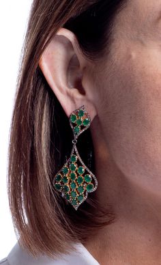 Faceted emeralds pop against their gold plated settings in these openwork earrings. Plate Sets, Emerald, Gold Plate, Plating, Drop Earrings, Gold