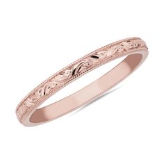 Delicate milgrain detail and graceful swirling design gives this elegant stackable band a vintage-inspired look. It features gleaming 14k rose gold design that promises lasting quality and beauty. 14k Rose Gold Stackable Rings, Classic Rose Gold Engraved Stackable Ring, Elegant Engraved Stackable Ring With Round Band, Elegant Engraved Stackable Round Band Ring, Elegant 14k Rose Gold Bands, Heirloom Stackable Rings With Decorative Band For Formal Occasions, Formal Heirloom Stackable Rings With Decorative Band, Rose Gold Rings With Decorative Band, Heirloom Style Formal Stackable Rings With Decorative Band