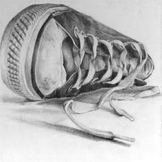 a pencil drawing of a shoe and tools