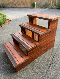 three wooden benches sitting next to each other