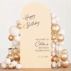 a welcome sign surrounded by balloons and candles